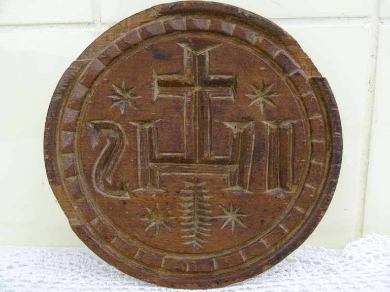 Religieuze houten boter-stempel uit circa 1680